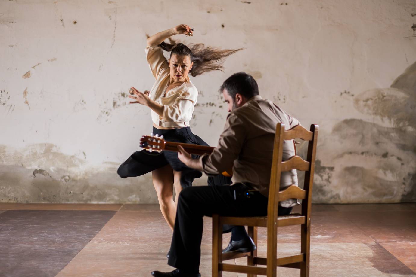Rocio Molina dances with abandon close to the flamenco guitarist